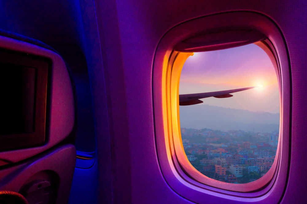 How to Sleep on a Plane: Where to Sit, What to Pack, and Sleep Tips