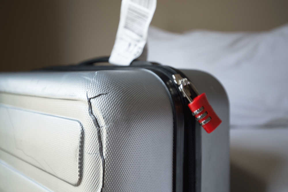 Suitcase broken by airline on sale