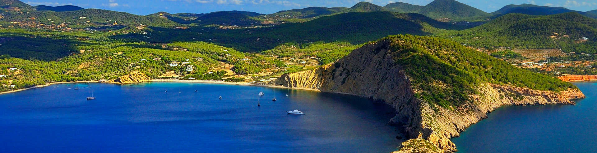 //s1.travix.com/eu/europe-spain-ibiza-sea-bay-xlarge.jpg