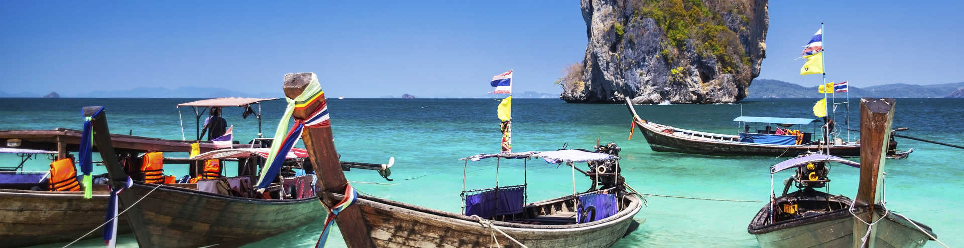 https://s1.travix.com/as/asia-thailand-beach-boats-xlarge.jpg