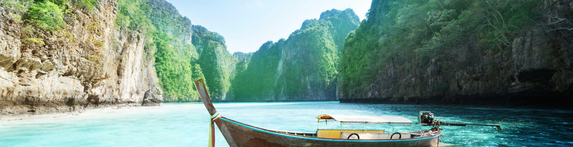 https://s1.travix.com/as/asia-thailand-krabi-boat-xlarge.jpg