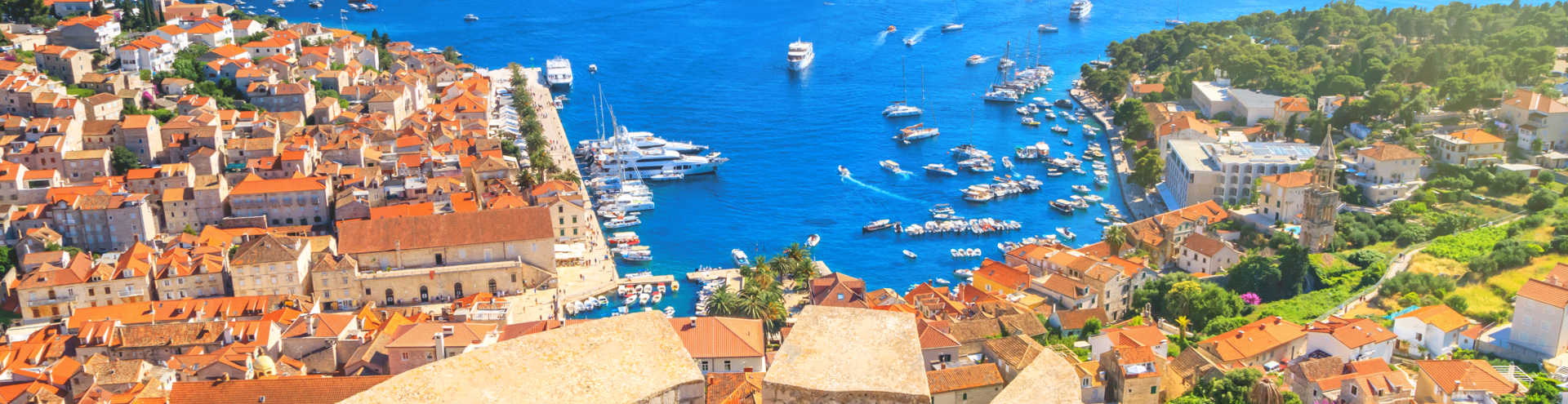 https://s1.travix.com/eu/europe-croatia-hvar-city-harbor-view-from-fortress-xlarge.jpg
