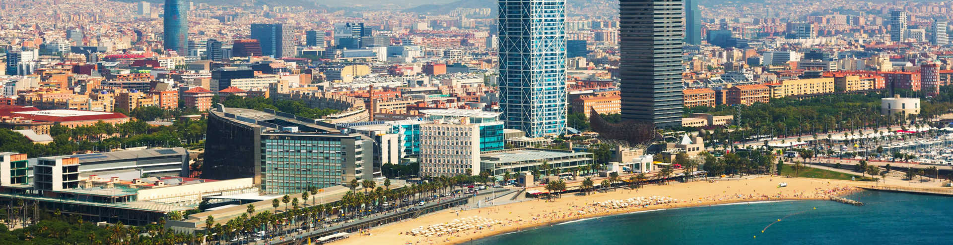 https://s1.travix.com/eu/europe-spain-barcelona-view-city-beach-xlarge.jpg