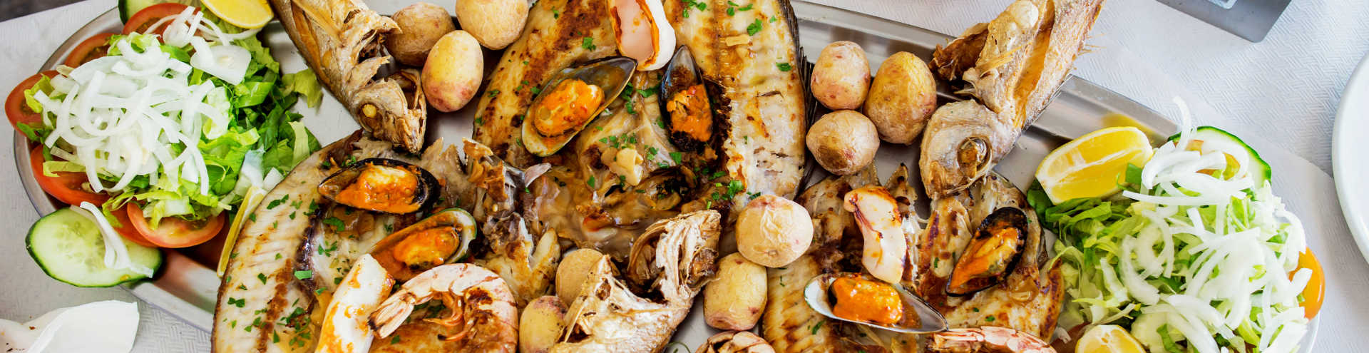 https://s1.travix.com/eu/europe-spain-fuerteventura-canary-islands-cuisine-fish-xlarge.jpg