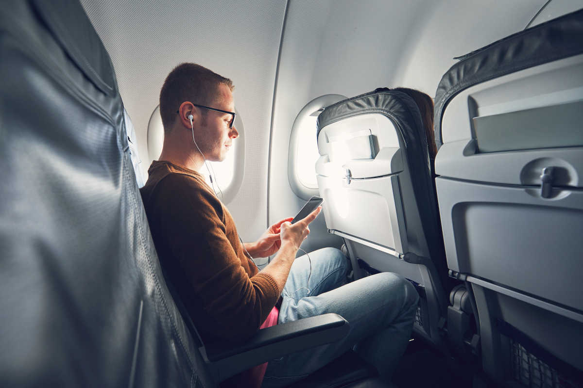 Why should we switch on Airplane Mode while flying