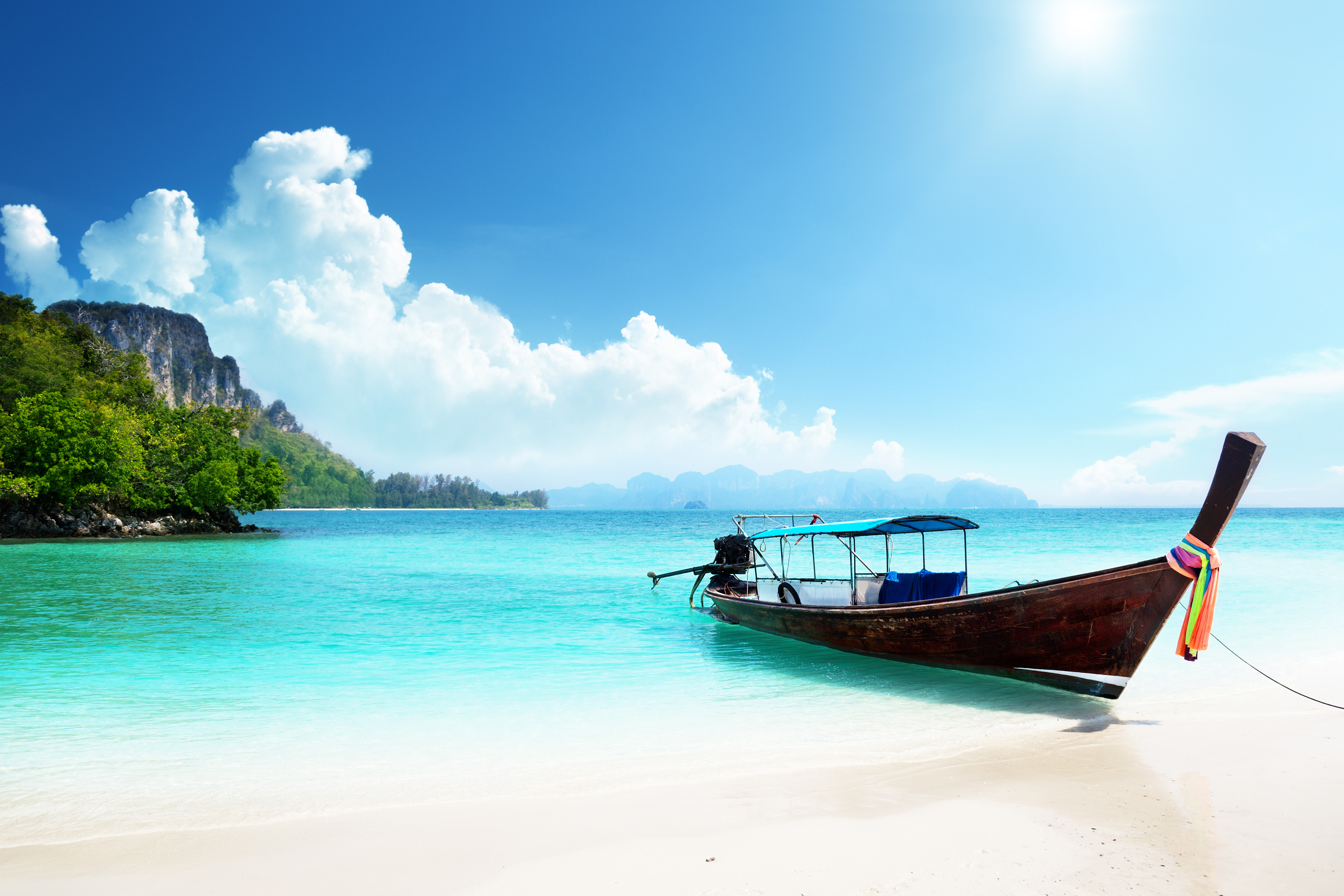 https://s1.travix.com/images/asia-thailand-phuket-beach-boat.png