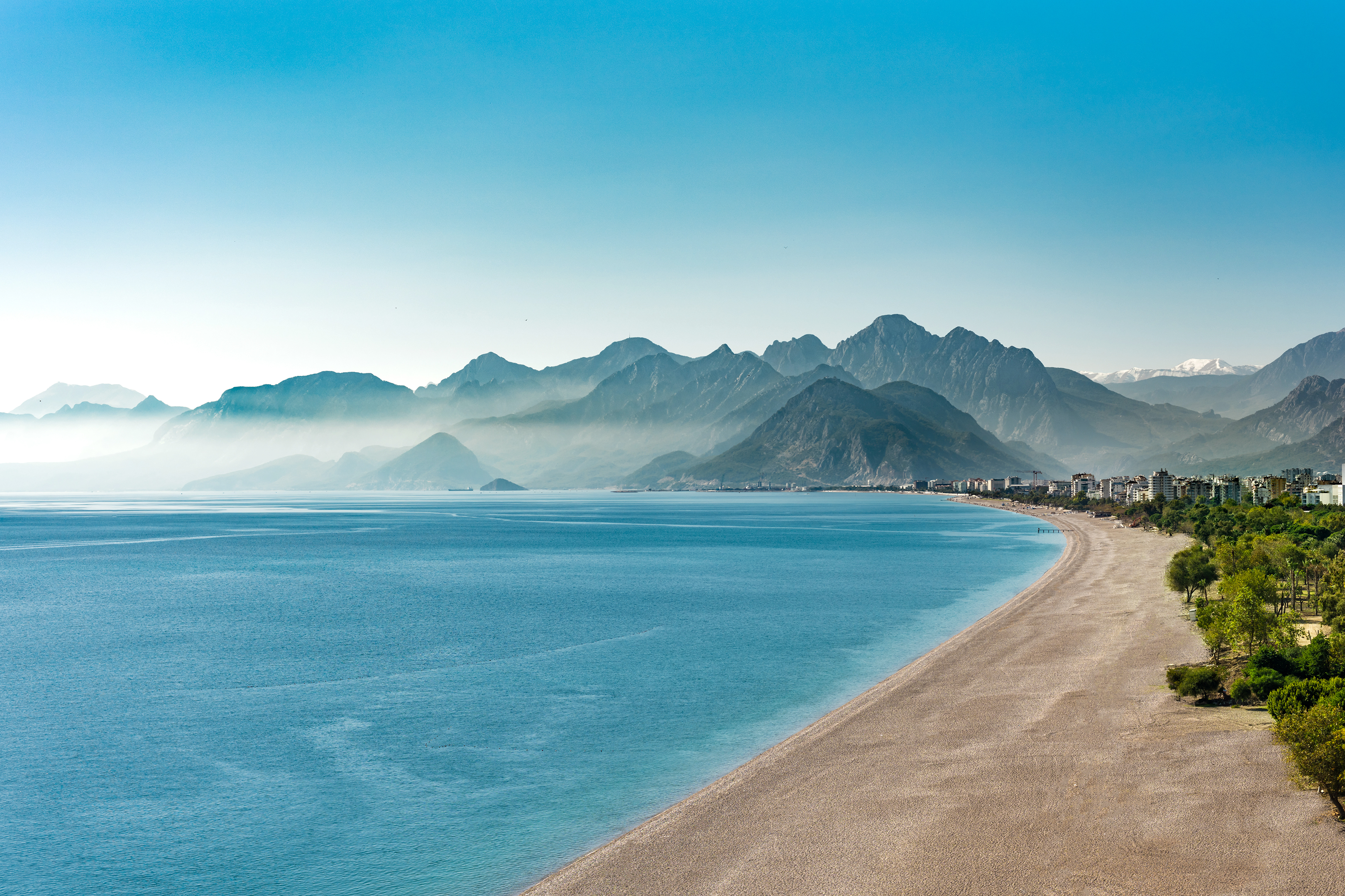https://s1.travix.com/images/asia-turkey-antalya-beach-mountains.jpg https://s1.travix.com/images/asia-turkey-antalya-beach-mountains.jpg