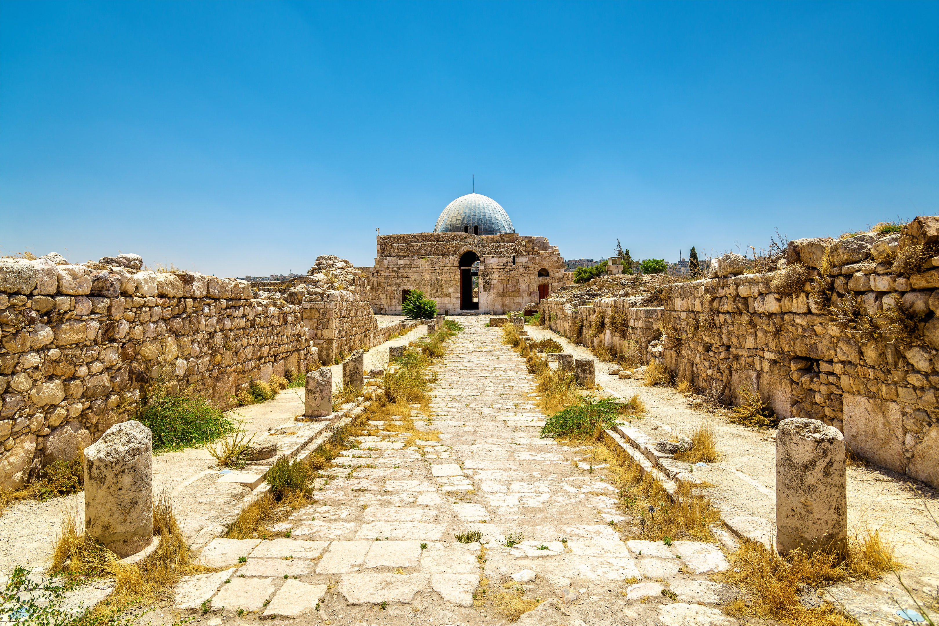 https://s1.travix.com/images/middle-east-jordan-amman-umayyad-palace.png https://s1.travix.com/images/middle-east-jordan-amman-umayyad-palace.png